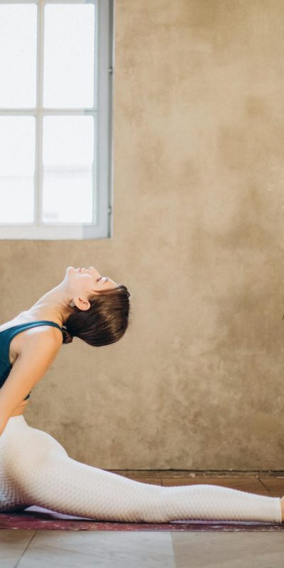 Woman Practicing Yoga Backbend